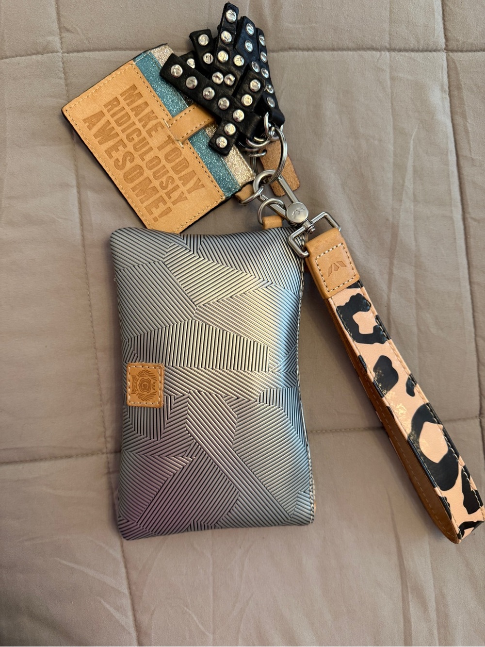 Consuela Metallic Silver Geometric Wristlet with Tan & Black Strap